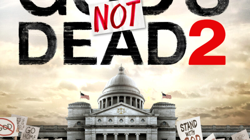 Protester crowd outside courthouse with woman in red, promoting God's Not Dead 2 movie theme of faith and justice.