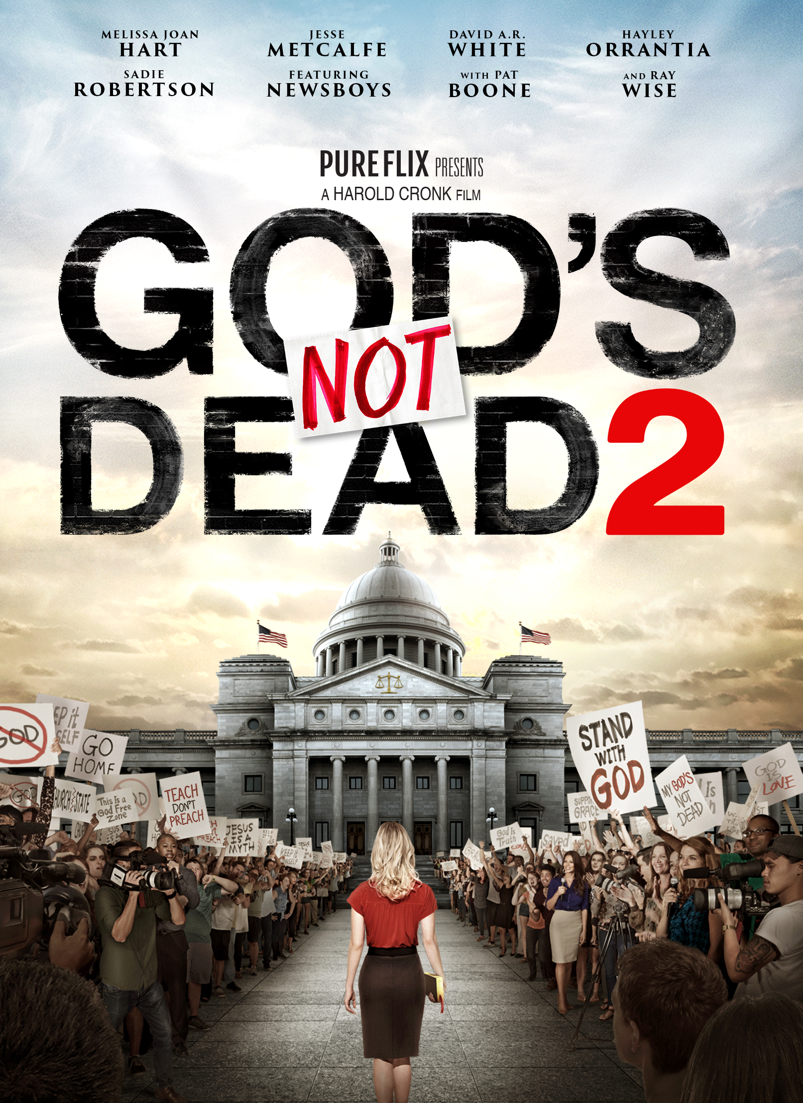 Protester crowd outside courthouse with woman in red, promoting God's Not Dead 2 movie theme of faith and justice.