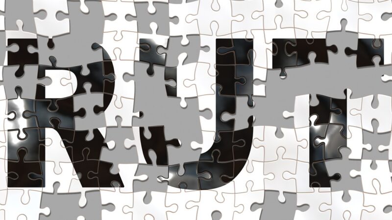 Puzzle pieces forming the word 'truth' in bold black letters on a contrasting white background.