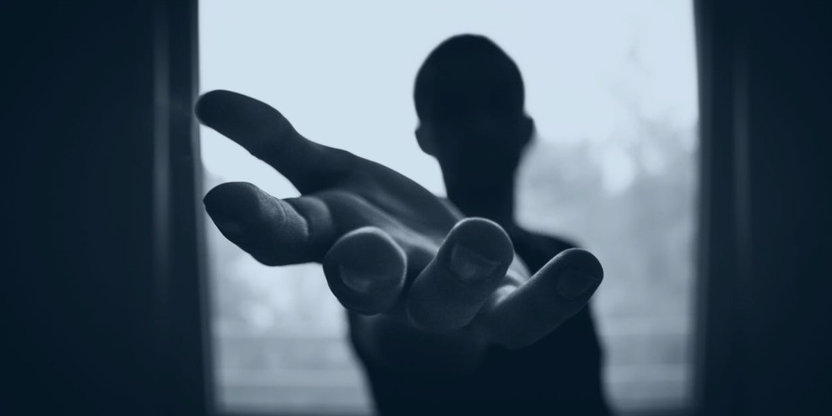 person holding out a hand