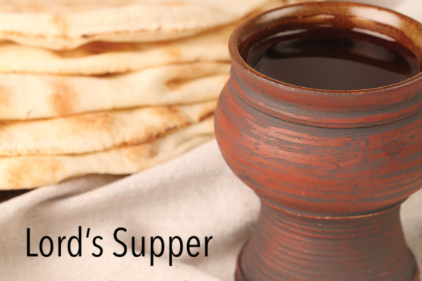 Clay cup with bread, text Lord's Supper March 29th, on a linen cloth background.