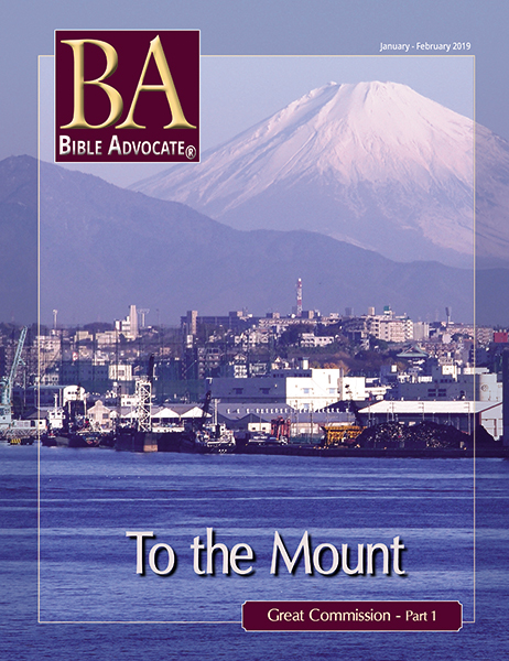 Bible Advocate magazine cover: Mountain view over city buildings, January-February 2019 issue titled To the Mount.