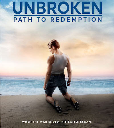 Man kneeling on beach with sunset, Unbroken: Path to Redemption movie poster showcasing resilience and hope.