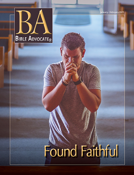 Man praying in a church aisle, cover of Bible Advocate magazine, January-February 2021 issue titled Found Faithful.