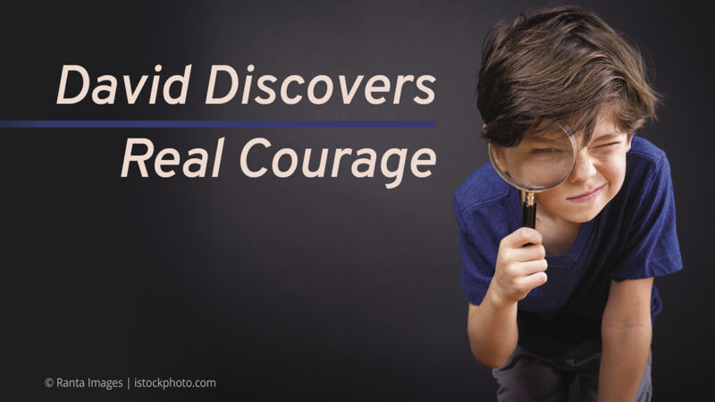 Young boy examining through magnifying glass with text David Discovers Real Courage on black background.