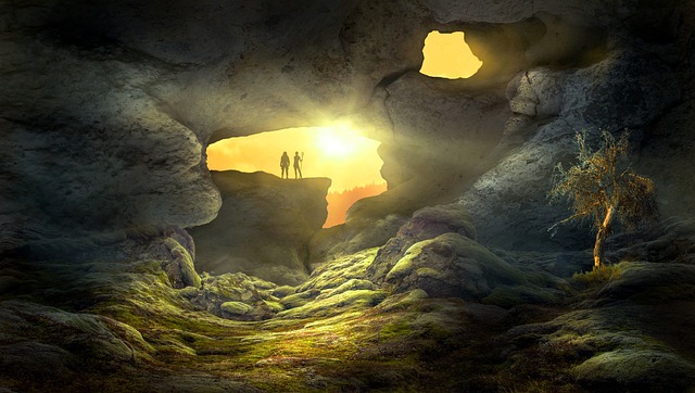 Mysterious cave with sunlight streaming through, highlighting figures and vibrant mossy landscape.